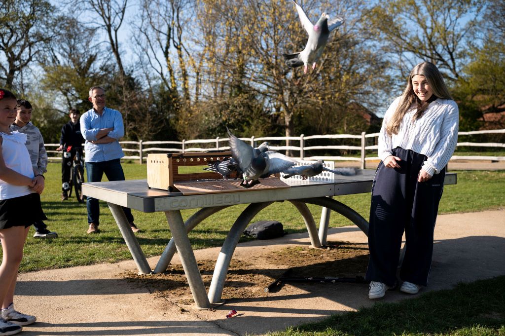 Two Youth Councillors release racing pigeons for 80th anniversary of VE Day